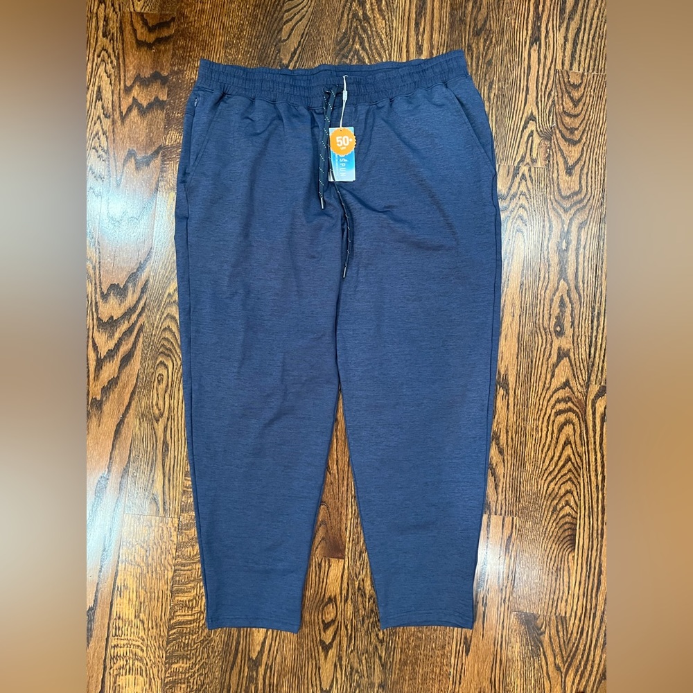 Puma Heather Navy drawstring pants with tags.